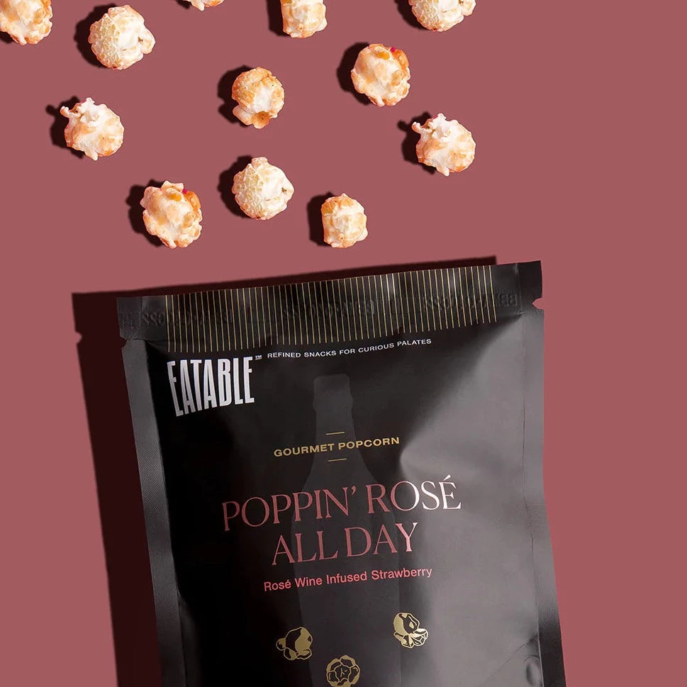Sweet. Fresh. Fruity. Air-popped whole-grain popcorn kernels coated in a light, crisp candied covering infused with rose wine. Slightly fizzy and tart with notes of watermelon and strawberry. Baked to deliver a satisfying crunch.