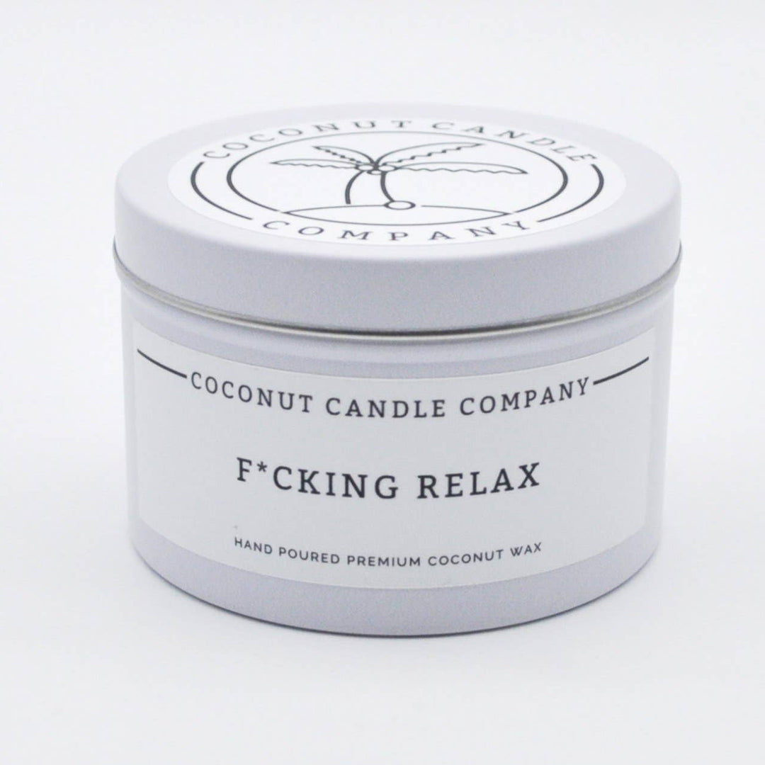 Coconut Candle Company candle in a tin with &