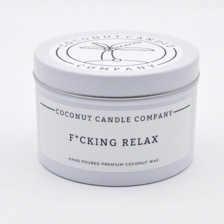 Coconut Candle Company candle in a tin with &