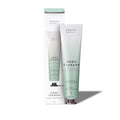 Two tubes of Midnight Paloma Hand Therapy on a white background