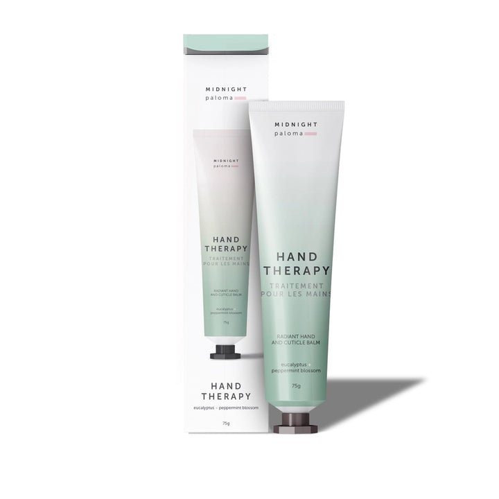 Two tubes of Midnight Paloma Hand Therapy on a white background