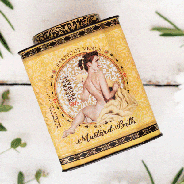 Barefoot Venus Mustard Bath Soak in a clear jar with a golden mustard-colored powder, perfect for relaxing spa and bath routines.