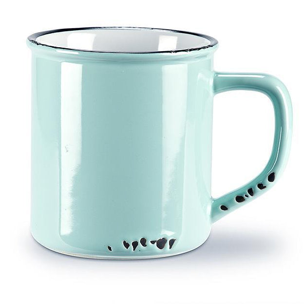 Light blue mug with decorative handle on a white background