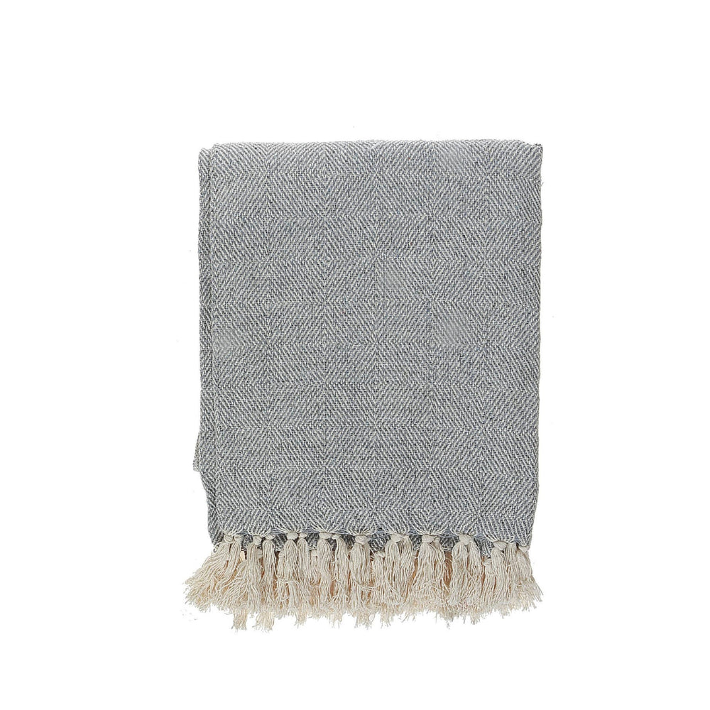 Gray textured throw blanket with white tassels on a white background