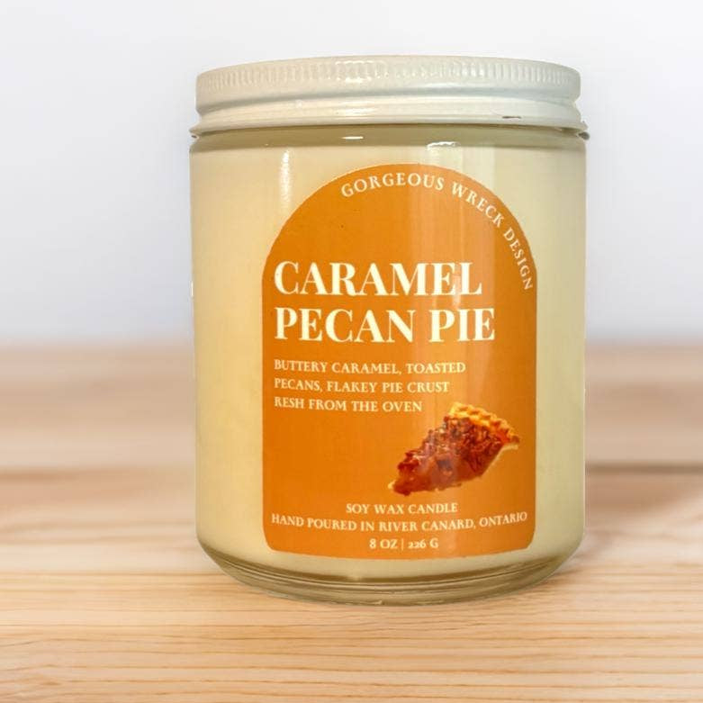 A jar candle labeled &