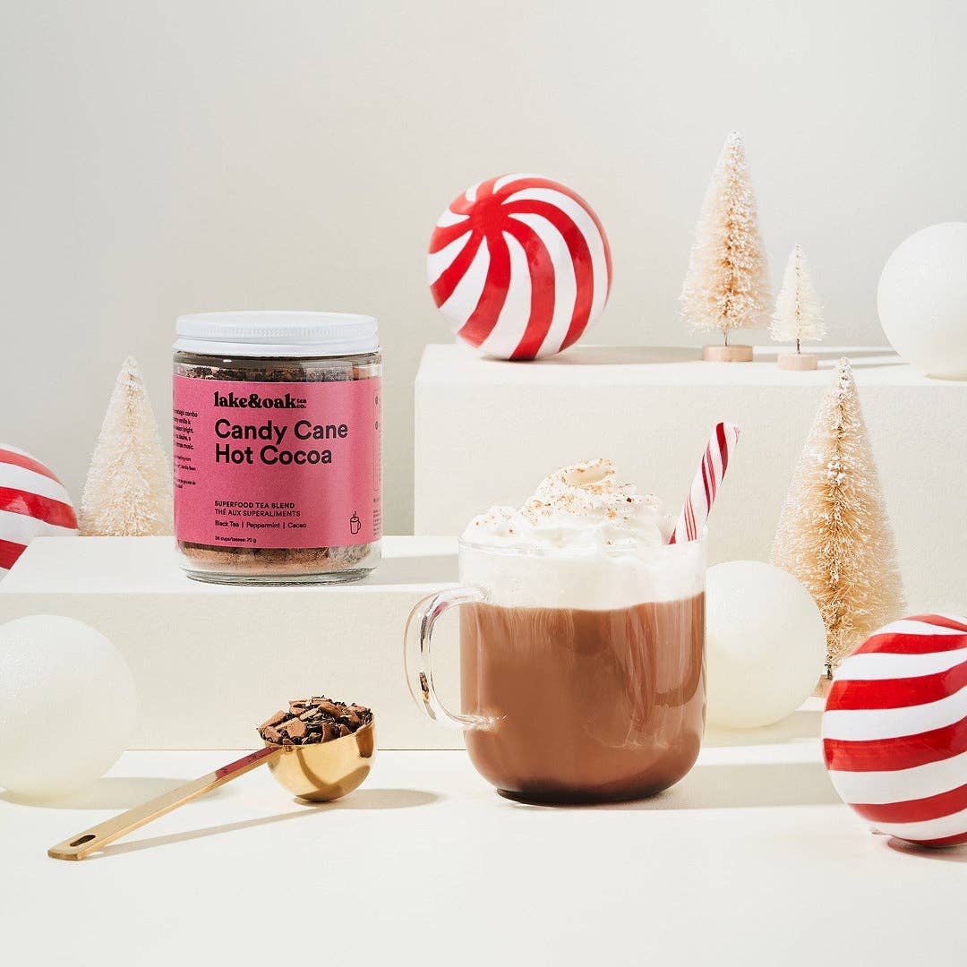 Lake &amp; Oak Tea Co. Candy Cane Hot Cocoa tea in a glass jar, 24 cups, with festive candy cane flavor and loose-leaf tea appearance.