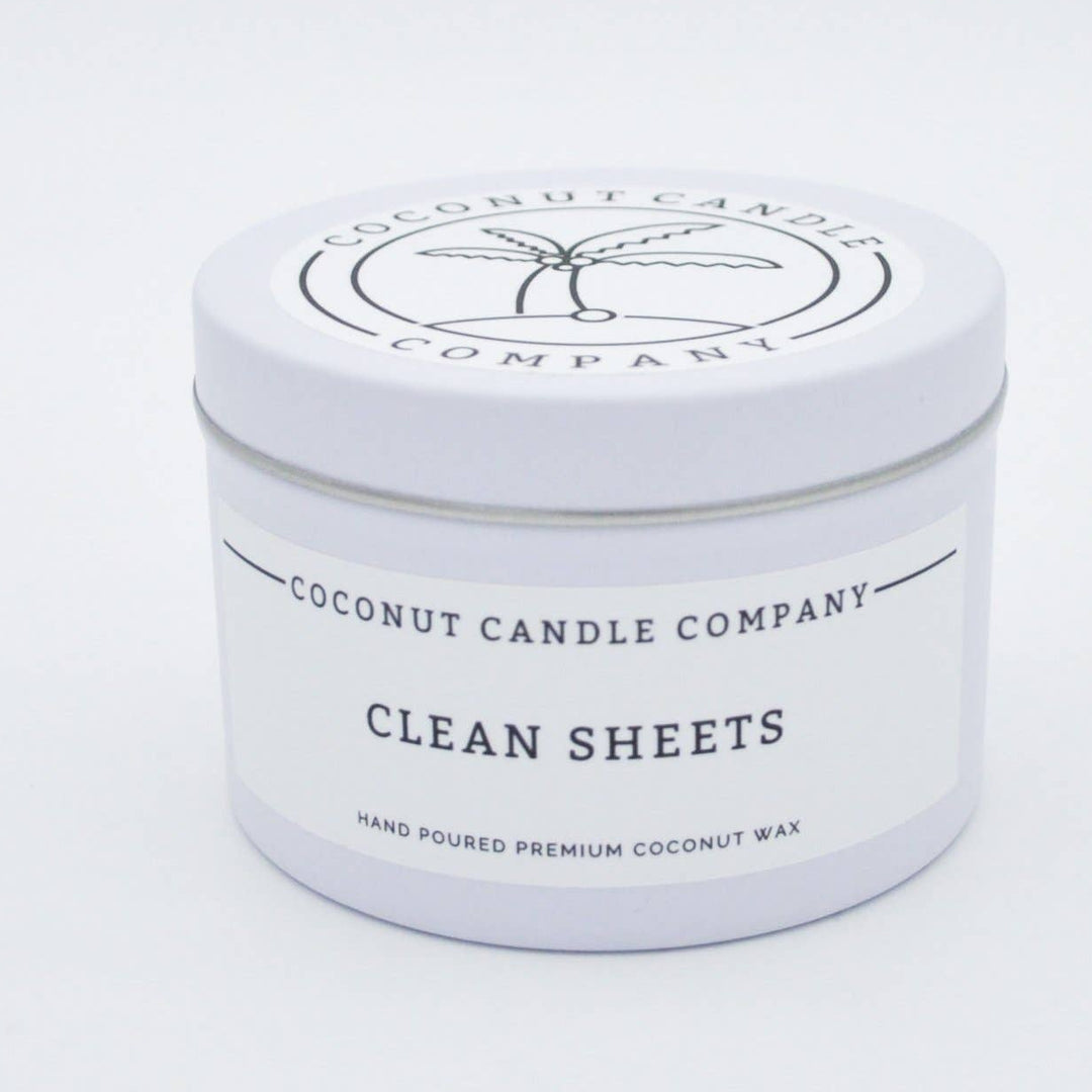 Coconut Candle Company candle in a white container on a light gray background