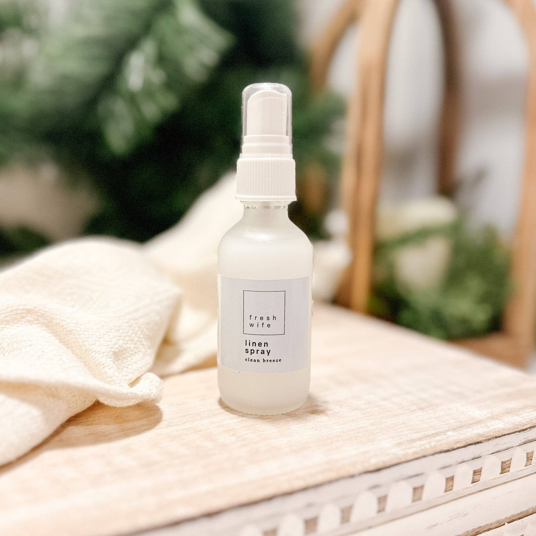White spray bottle labeled &