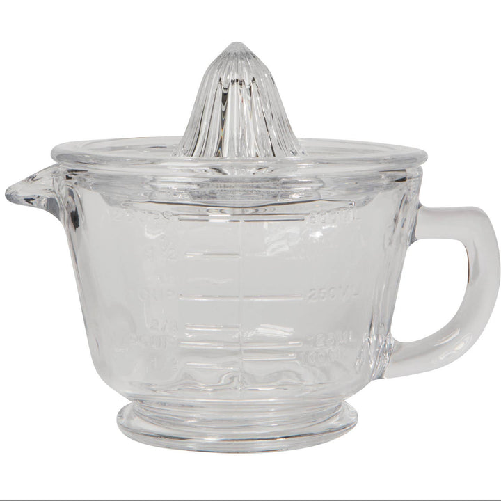Clear glass citrus juicer on a white background