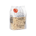 Fusilli pasta in a clear glass jar from Favuzzi, showing spiral-shaped dry pasta in a pantry setting.