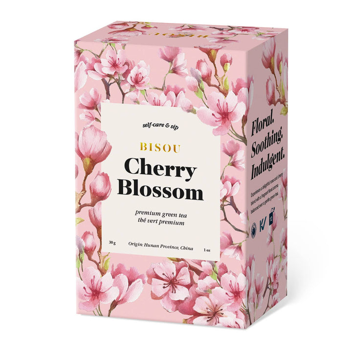 Bisou Cherry Blossom tea box with floral design on a white background