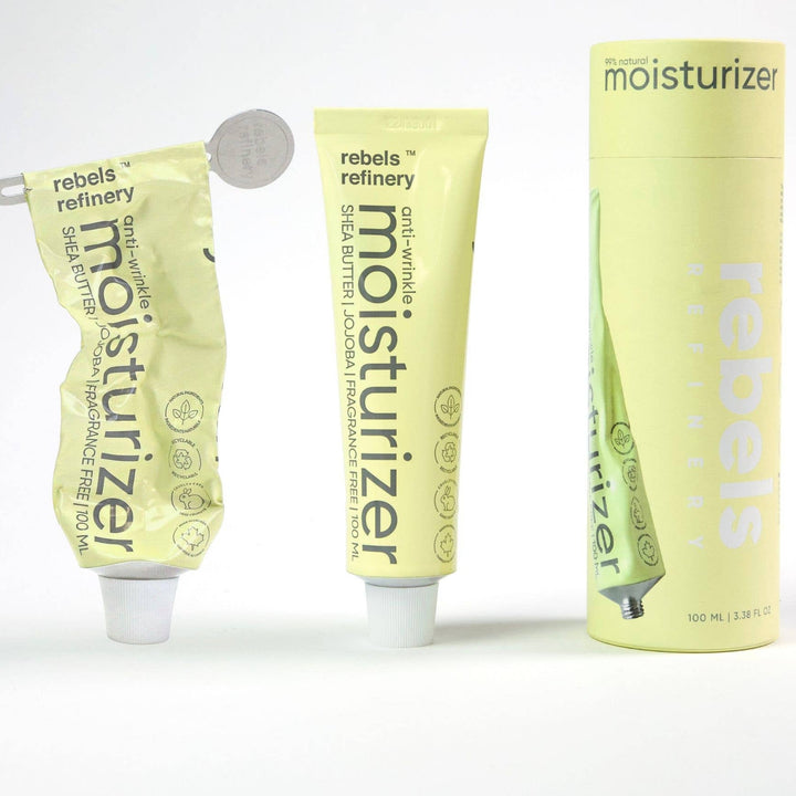 Three tubes of rebels refinery moisturizer on a white background