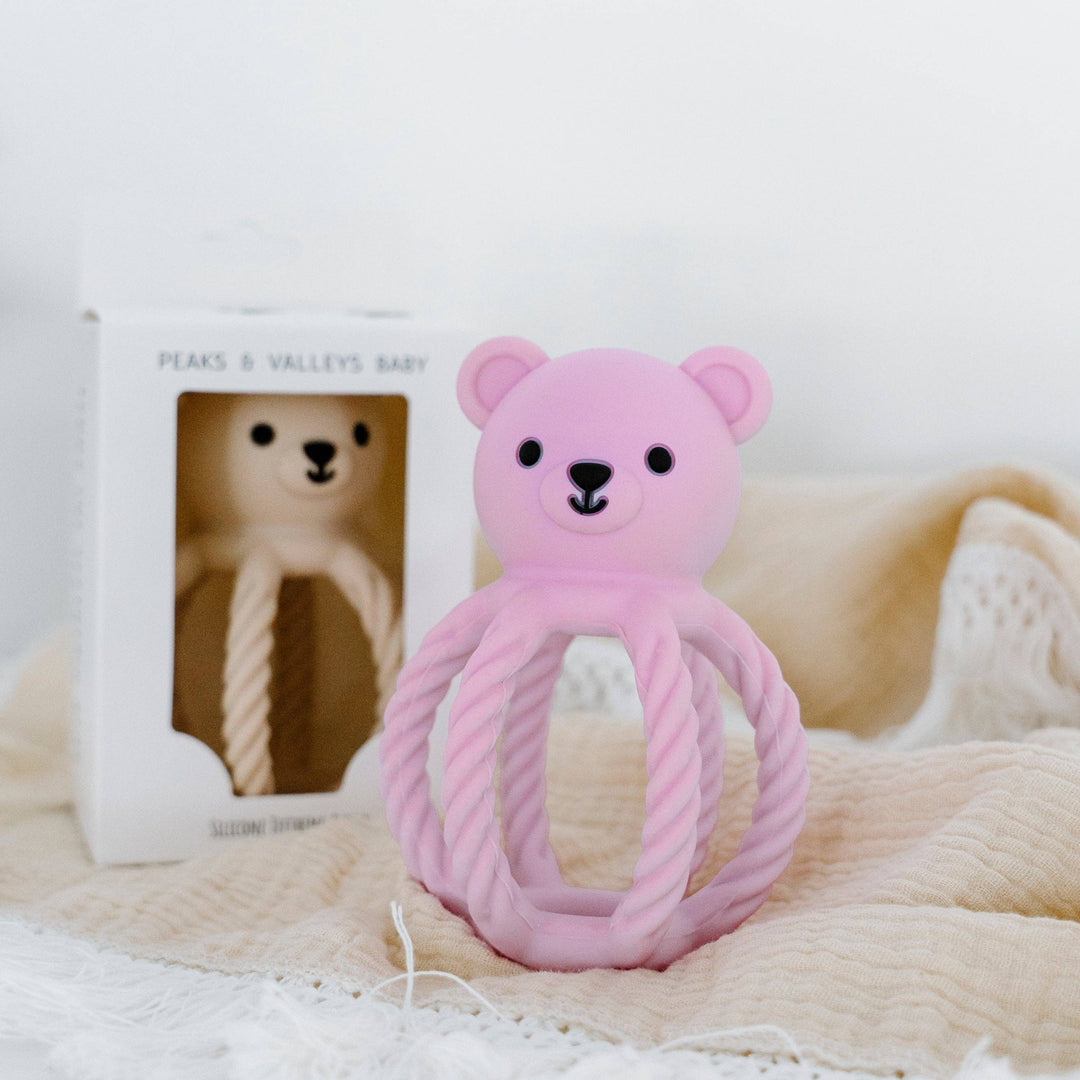 Lilac Teddy the Teething Bear by Peaks &amp; Valleys Baby, soft plush toy with textured teething surfaces for infants.