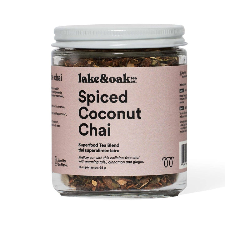 Jar of spiced coconut chai tea blend with a white lid on a white background