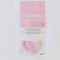 Pink packaging of sugarjoy on a white background