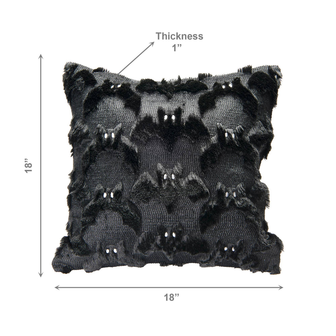 Black textured throw pillow with a raised bat pattern and small white bead accents, shown with dimension arrows indicating 18 by 18 inches and 1-inch thickness on a white background.