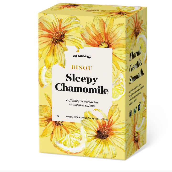 Tea box with chamomile design and text on a white background