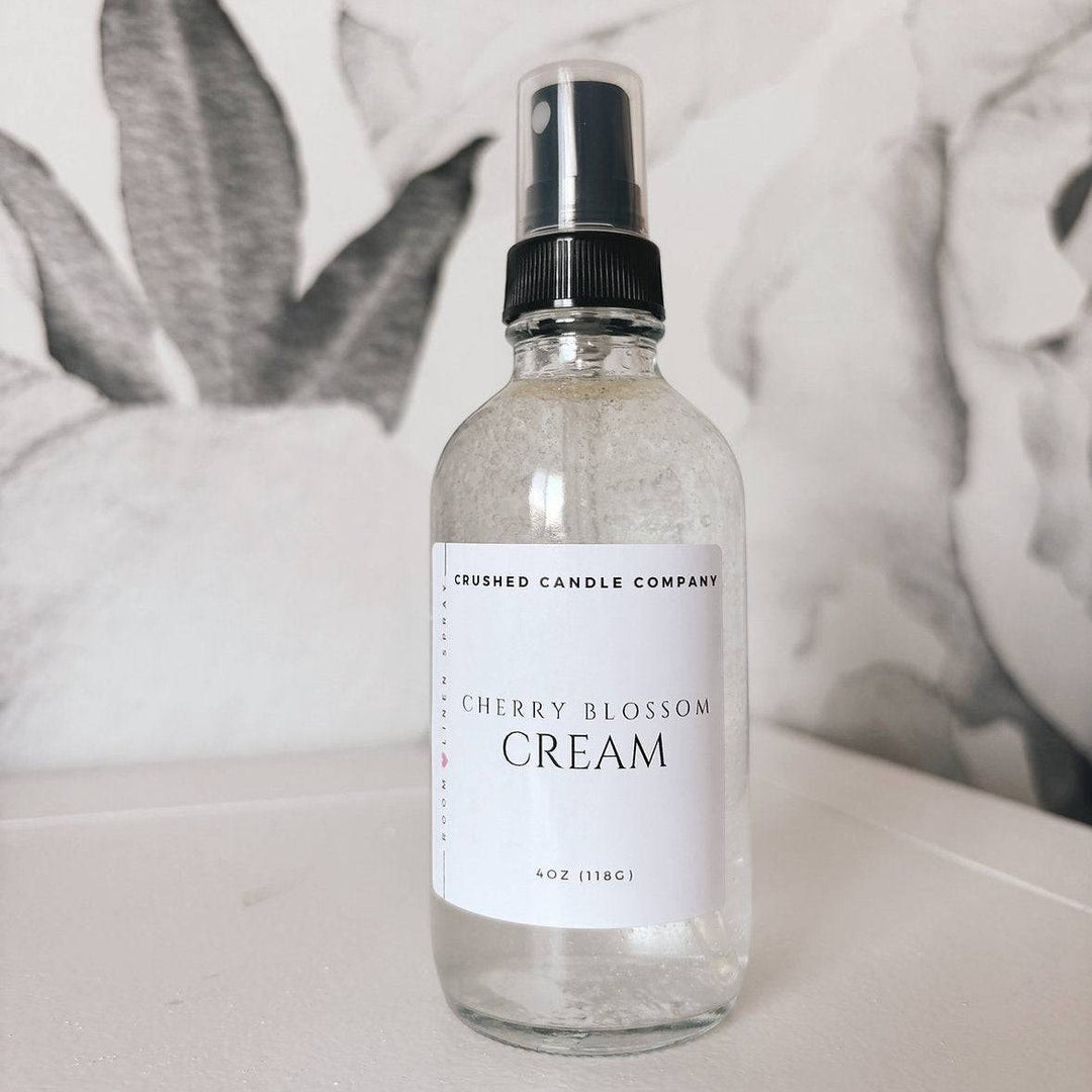 Crushed Candle Company Cherry Blossom and Cream Linen Spray bottle with floral label for home fragrance.
