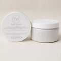 White container with lid on a beige background