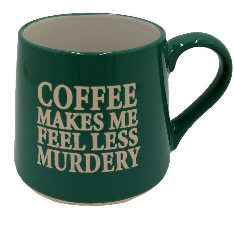 Green mug with white text 'Coffee makes me feel less murdery' on a white background