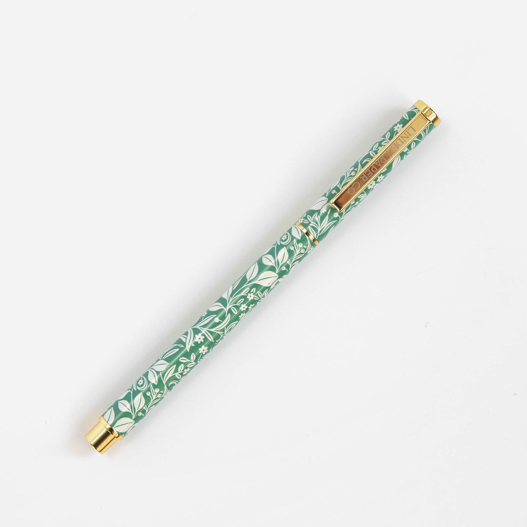 Linden Paper Co. Meadowlace rollerball pen with sleek design, ideal for writing on books, office, and stationary surfaces.