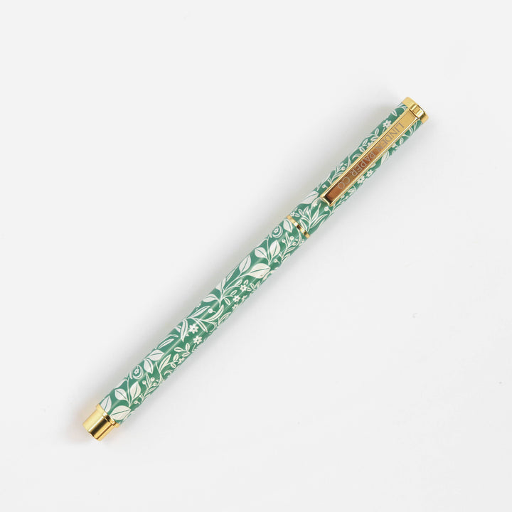 Linden Paper Co. Meadowlace rollerball pen with sleek design, ideal for writing on books, office, and stationary surfaces.