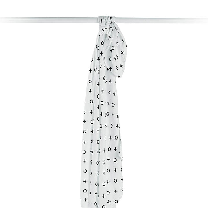 White scarf with black plus signs on a white background