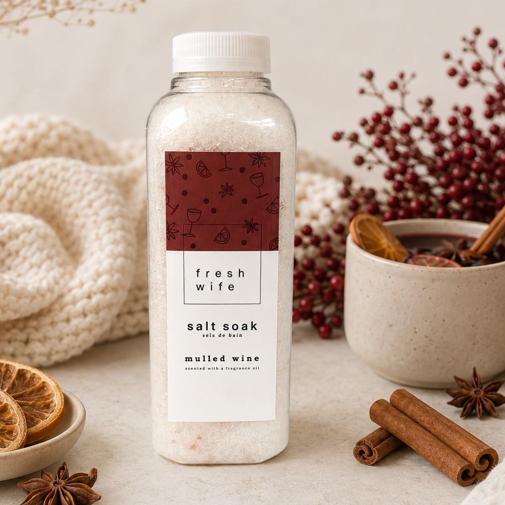 A clear plastic bottle of Fresh Wife Salt Soak, labeled &