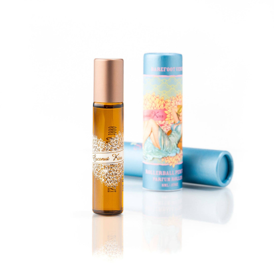 Coconut Kiss rollerball and its packaging on a white background