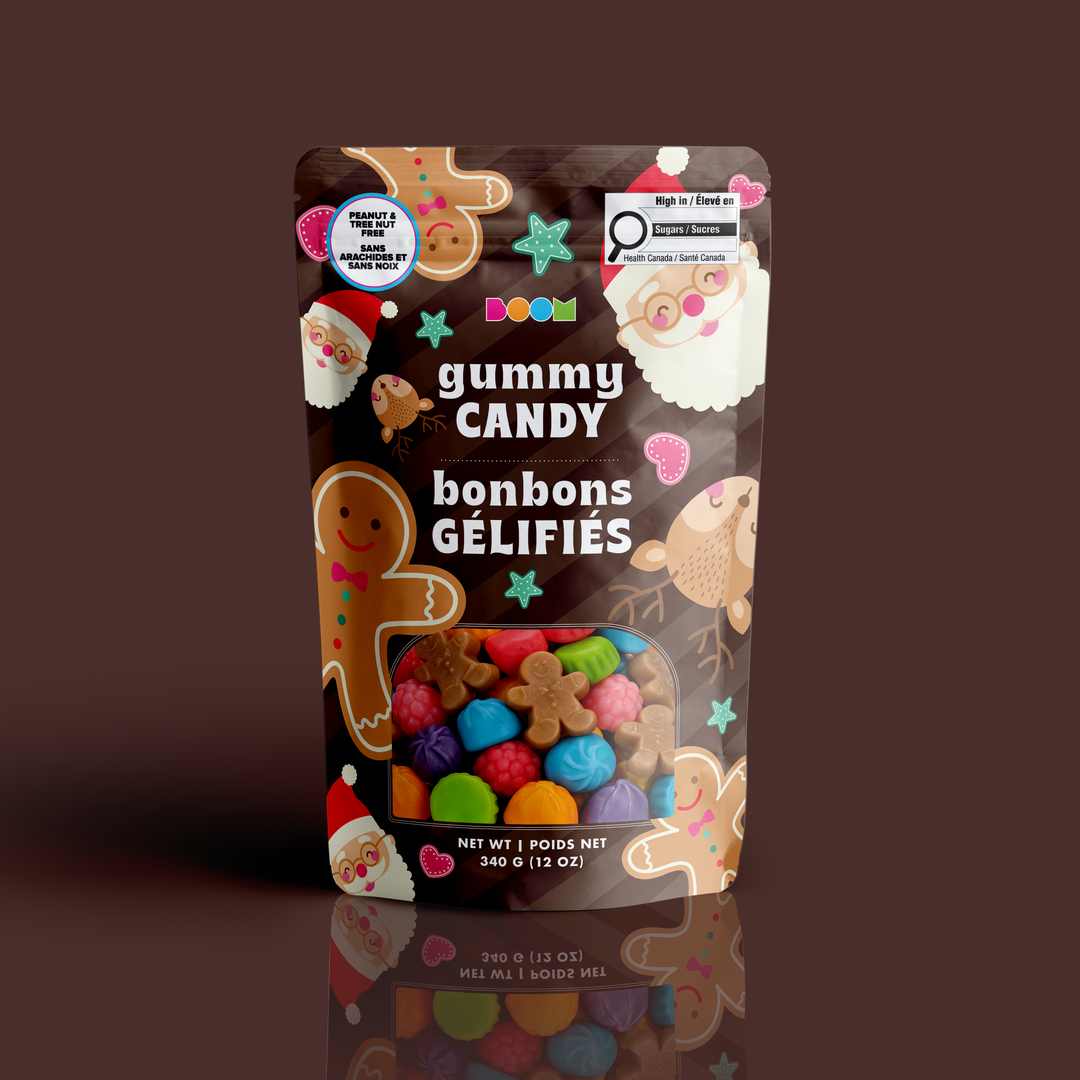 Assorted Boom Candy gummy candies featuring Santa, gingerbread men, and reindeer in a 340g bag, colorful and festive candy treats.