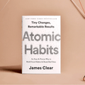 Cover image of the book "Atomic Habits" by Gift Smack Gift Company, featuring a clean design and title text.