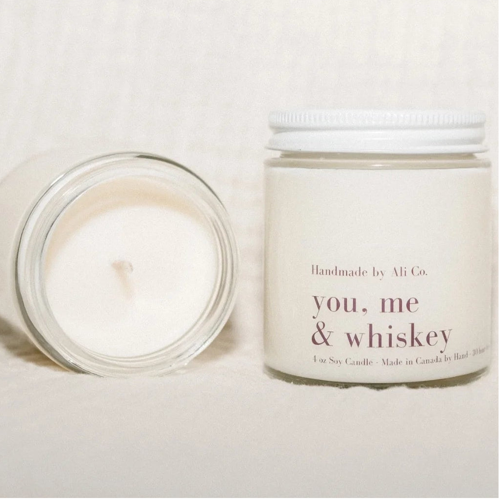 Candle and jar labeled &