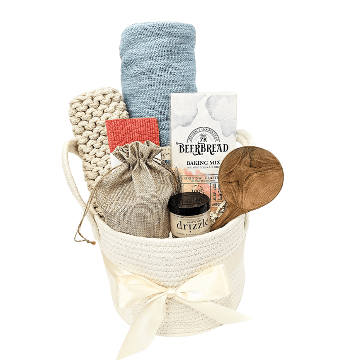 Warm cozy home gift basket by Box Builder featuring soft blankets, candles, and comforting items in a stylish box.