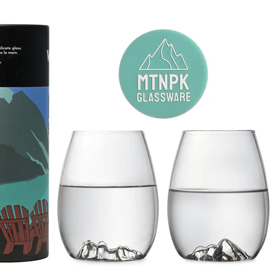 Wine set packaging with scenic designs and two glasses on a white background