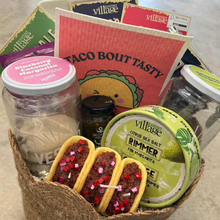 Taco Tuesday gift basket by Gift Smack Gift Company with assorted taco ingredients in a cardboard box.