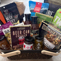 Box Builder Ultimate BBQ Gift Basket with assorted grilling tools, sauces, and snacks in a stylish gift box.