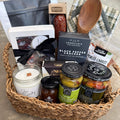Food gift basket by Gift Smack Gift Company with assorted snacks and treats arranged in a decorative box.