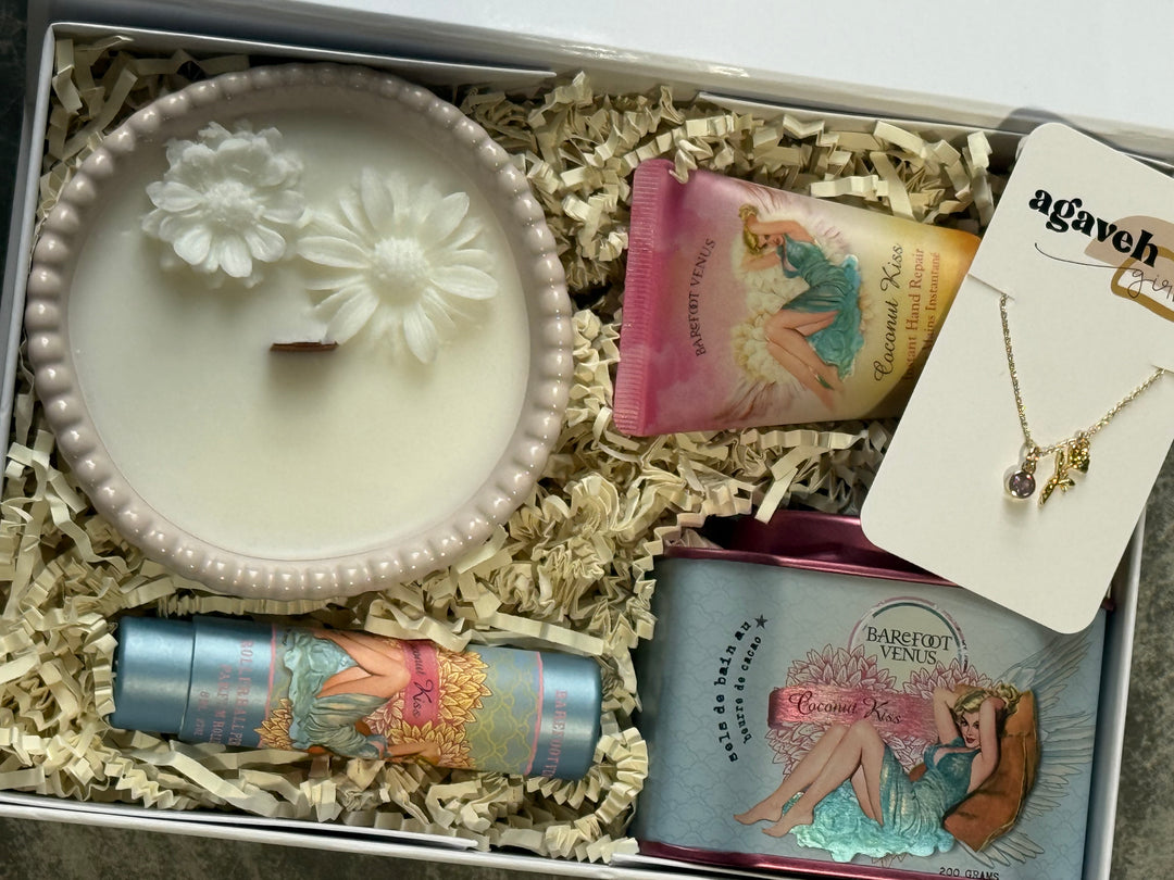 Gift set with candle, soap, and necklace in a box