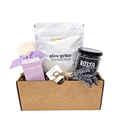 Glow Getter Mod-Box by Gift Smack Gift Company, a box builder with various products, shown in a London fog gift basket.