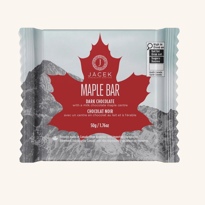Jacek Maple Bar packaging with a red maple leaf design on a white background