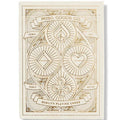Theory11 Misc. Goods Co. ivory playing cards, featuring motivational card designs, laid out on a flat surface.
