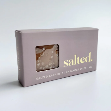 Box of salted caramels with 'salted' branding on a white background