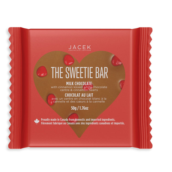 Red packaging of Jacek The Sweetie Bar with heart-shaped chocolate design