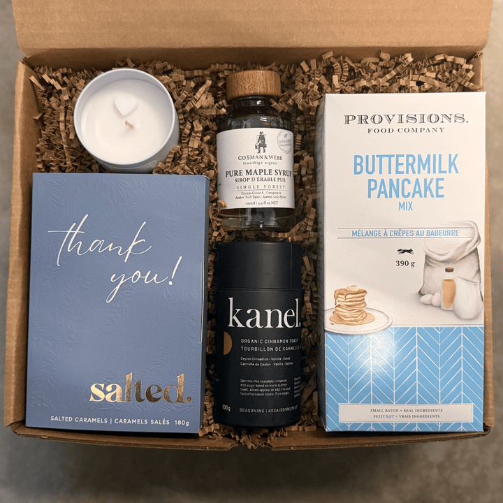A Saturday Brunch Gift Box by Gift Smack Gift Company, featuring assorted brunch items arranged in a decorative box.