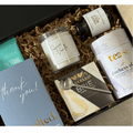 Gift Smack Treats & Thanks gift box, a colorful assortment of snacks and goodies in a box builder packaging.