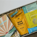 Gift Smack Gift Company Good Mood Gift Box, a colorful box builder with cheerful contents for a thoughtful gift.