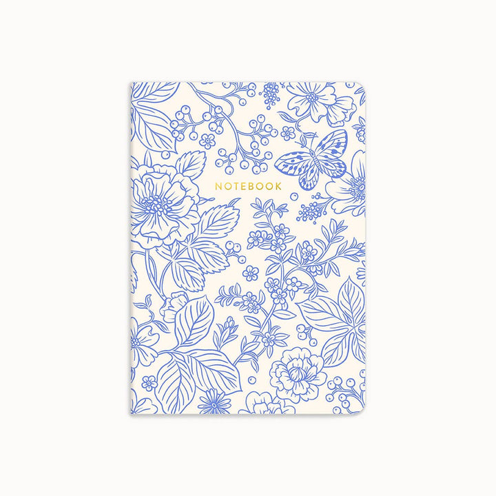 Notebook with blue floral pattern on a white background