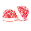 Two red heart-shaped gummy candies with white sugar on a white background