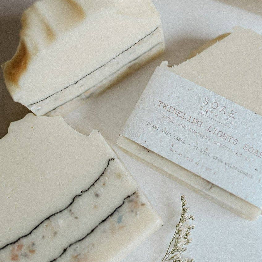 Twinkling Lights soap bar by SOAK Bath Co featuring a colorful, shimmering design with a festive, sparkling appearance.