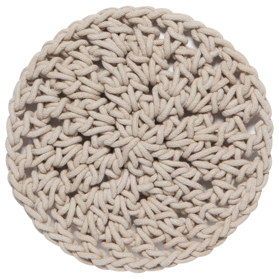Round woven beige ottoman on a white background